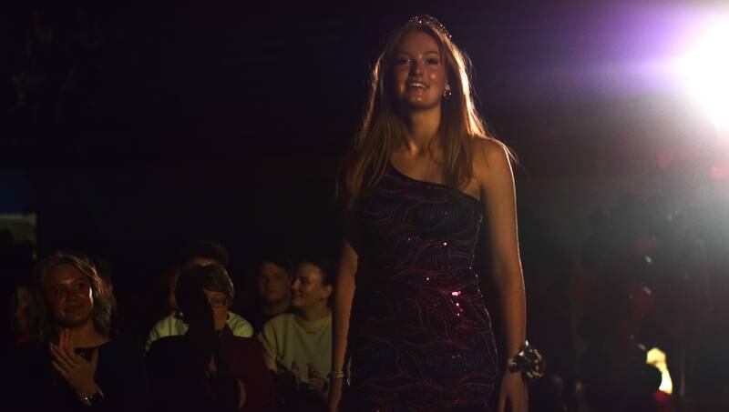 Izzy Wilson, the 2023 Newton Homecoming Queen, participates in coronation on Sept. 19 in the gymnasium. Eight senior boys and eight senior girls were chosen for this year’s Homecoming court, and the king and queen was crowned during the ceremony.
