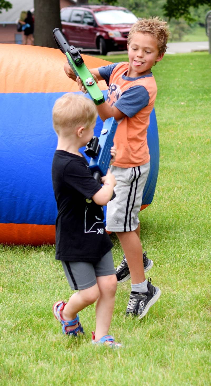 Kids enjoy all the games and activities available in the Fun Zone of Newton Fest on Saturday, June 10 at Maytag Park.