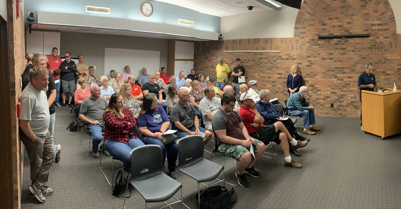 Landlords gather inside the council chambers on Oct. 3 to discuss their issues with the City of Newton's rental housing inspection program. Many of them say they are losing money and irreplaceable housing stock because of the program.