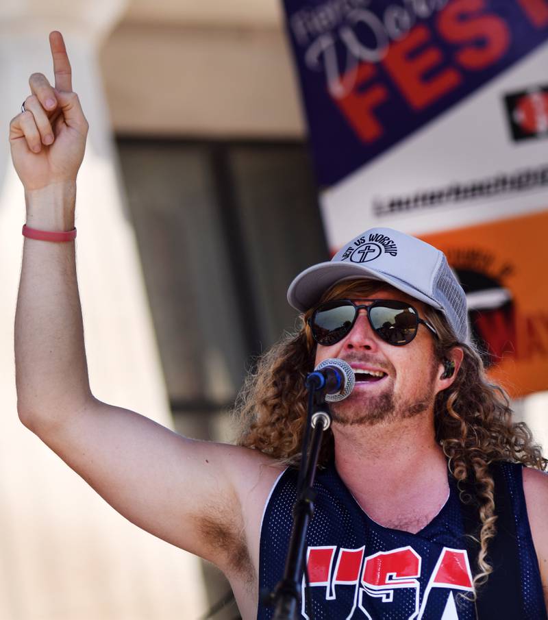 Sean Feucht performs during the inaugural Fierce Faith Music Worship Fest on June 19 in downtown Newton.