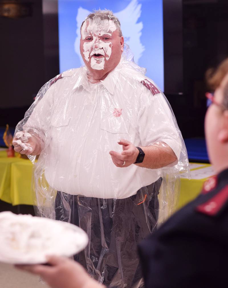 As a result of Rotary raising more funds for the Salvation Army than Kiwanis, Captain  Tim North voluntarily took a pie to the face during a volunteer recognition dinner April 19 at the organization's Newton headquarters.