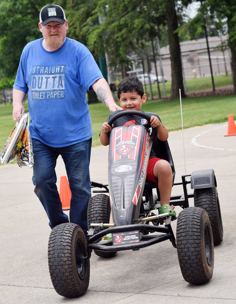 Kids enjoy all the games and activities available in the Fun Zone of Newton Fest on Saturday, June 10 at Maytag Park.