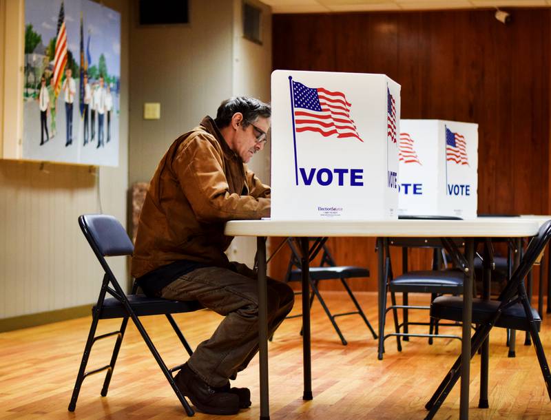 Voters fill out their ballots during Election Day on Nov. 5 inside a precinct at the American Legion Post 111 in Newton. The Jasper County Auditor's Office reported a 75 percent voter turnout this year.