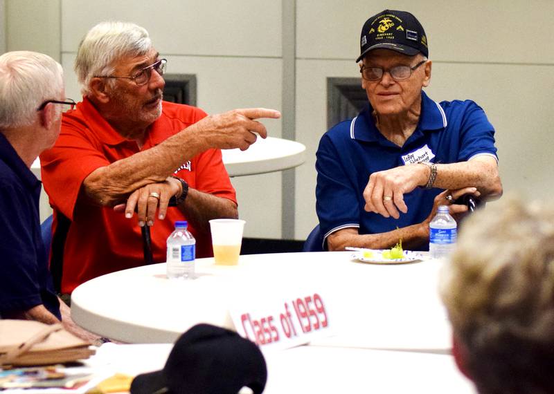 Newton High School graduates gather for drinks and camaraderie at the all-class reunion June 7 at Legacy Plaza. Newton Alumni Weekend brought back Cardinals for a weekend of partying and fellowship.