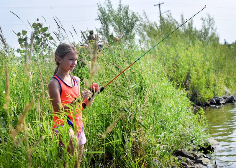 Young anglers catch bluegills and bass (and sometimes softshell turtles) during the Youth Fishing Derby on June 3 at Quarry Springs in Colfax.