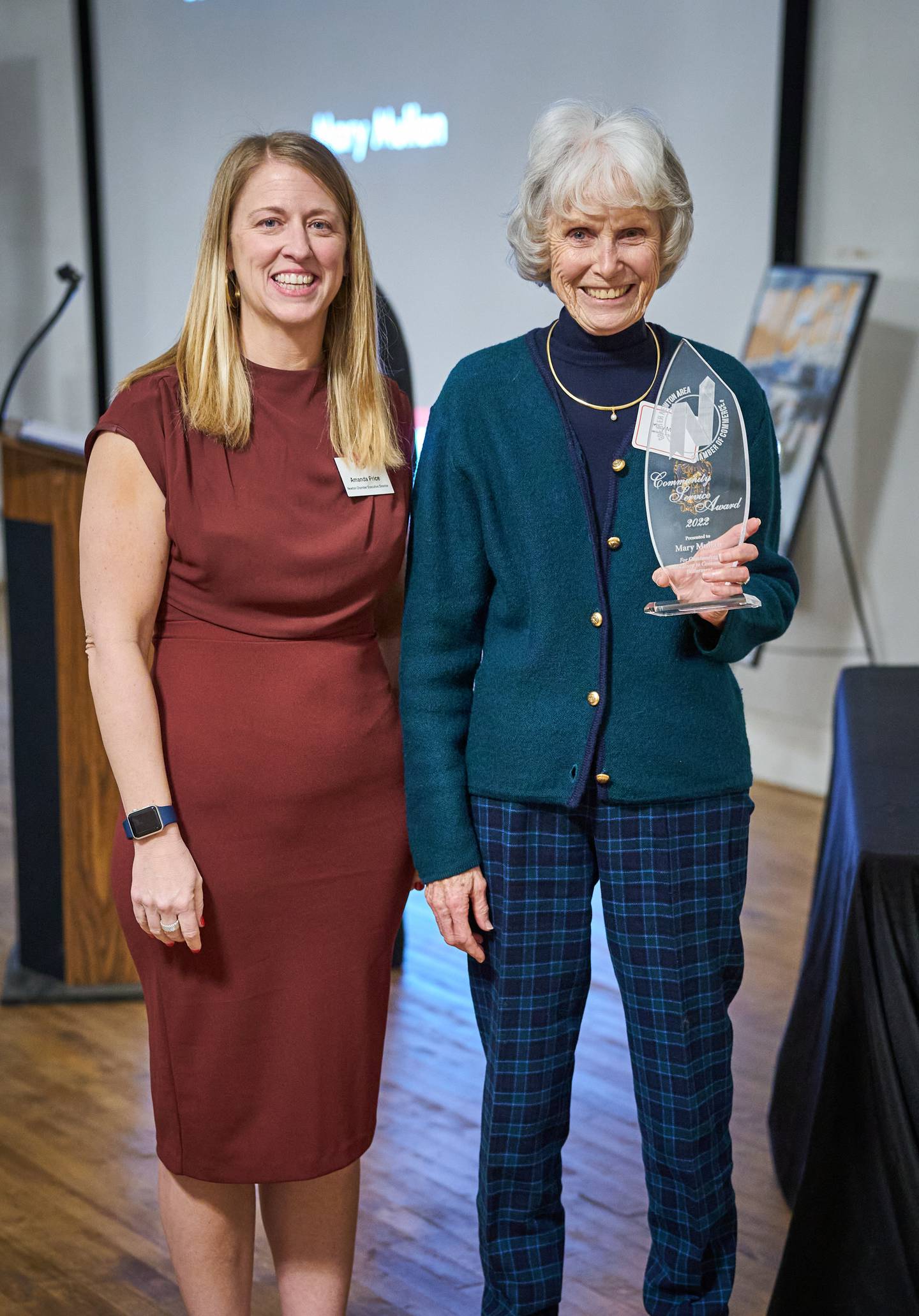 Mary Mullan accepts the Community Service Award during the Greater Newton Area Chamber of Commerce's annual meeting on Jan. 26 at The Thunderdome.