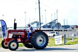 Iowa Speedway let farmers ride in style with WHO Great Tractor Ride