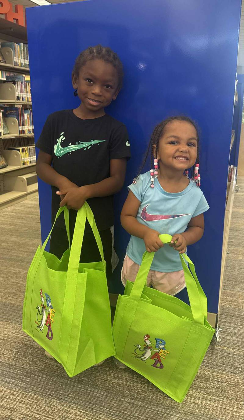 Siblings complete the 1,000-book challenge.
