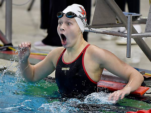White’s victory headlines big day in the pool for Newton girls swim team