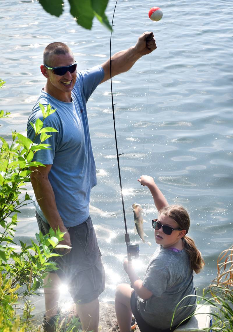 Young anglers catch bluegills and bass (and sometimes softshell turtles) during the Youth Fishing Derby on June 3 at Quarry Springs in Colfax.