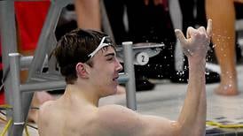 Martin sets more school records as Newton swim team wins home invitational