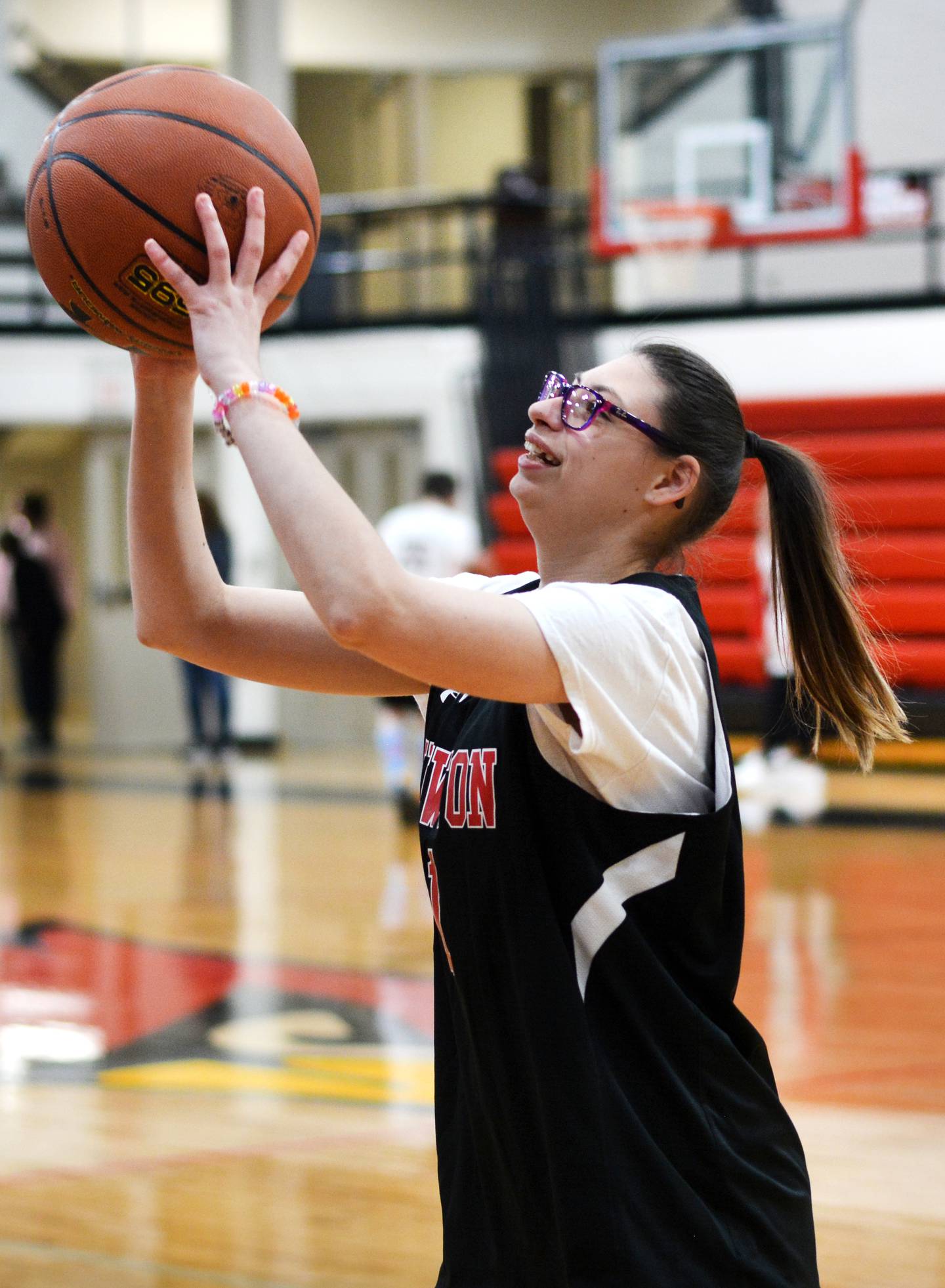 Grace Russell shoots a jump shot during a practice for The Big Game inside the gymnasium at Newton High School.