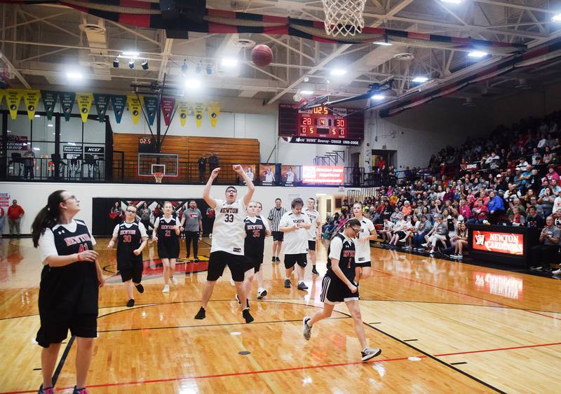 Thomas Russell attempts the final jump shot of The Big Game on April 19 at Newton High School.