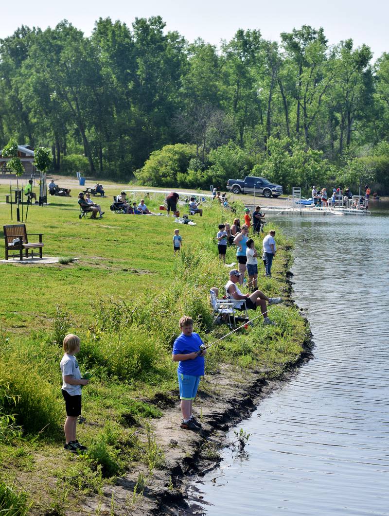 Young anglers catch bluegills and bass (and sometimes softshell turtles) during the Youth Fishing Derby on June 3 at Quarry Springs in Colfax.