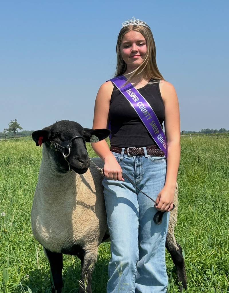 2025 Jasper County Sheep Queen Hailey Dodge’s favorite part of caring for her animals is bottle feeding the lambs in the spring.