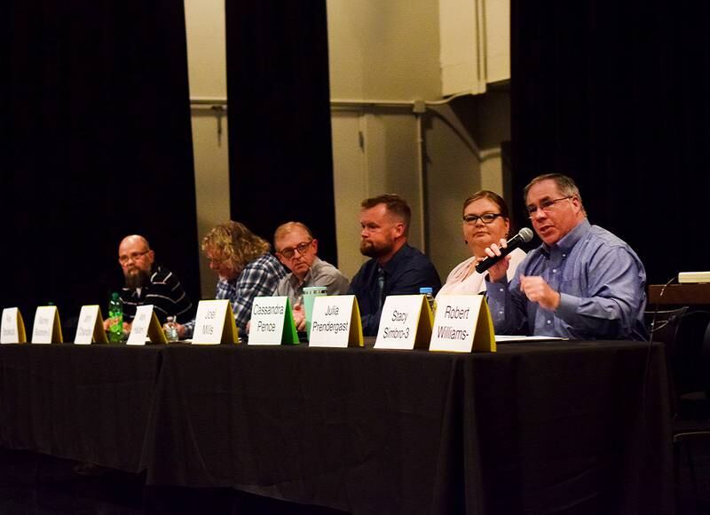 Newton City Council candidates Ron Bookout, Jerry Chandler, Mark Hallam, Joel Mills, Cassandra Pence and Stacy Simbro take turns speaking during the League of Women Voters forum on Oct. 24 at DMACC Newton Campus.