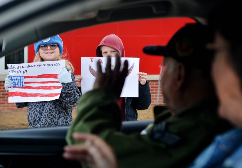 Newton Community School District students and staff participate in a Veterans Day Reverse Parade on Nov. 11, which extended to a number of school buildings in the area.
