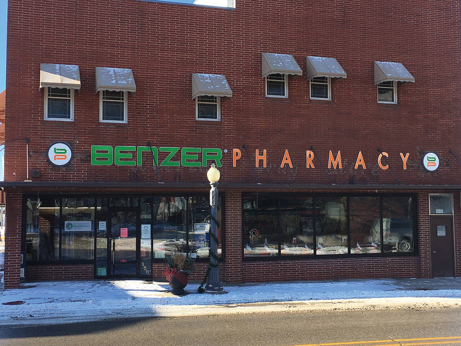 Benzer Pharmacy removes decadesold sign Newton Daily News