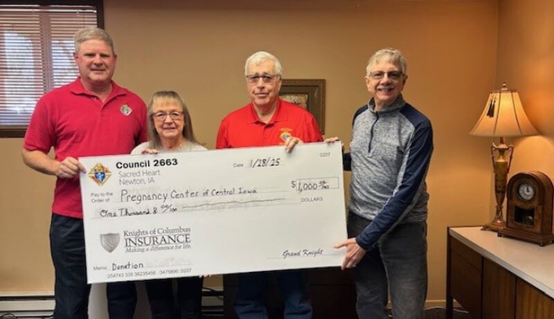 Pictured from left to right are Jeff Hoebelheinrich, Rita Baker, Mark Hammer and Bruce Corlew.