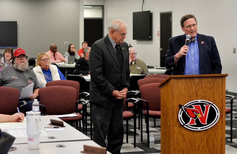 From left: Sen. Ken Rozenboom and Rep. Jon Dunwell speak to Newton scool board members at a past meeting in the E.J.H. Beard Administration Center.
