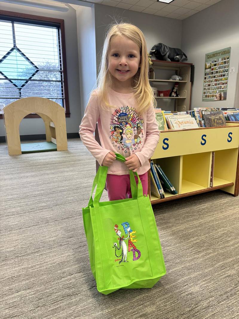 Katie Springer, 4, is the Newton Public Library's most recent reader of 1,000 books.