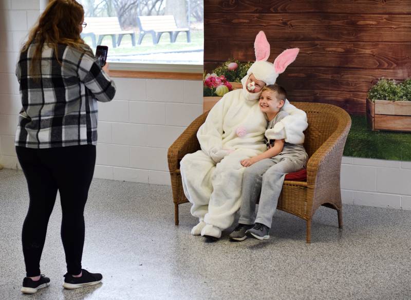 The Easter Bunny poses for pictures during the Spring Celebration on April 2 at the Prairie City Community Building.