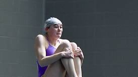 Pair of 50s lead Baxter’s Russell to second consecutive state diving championship