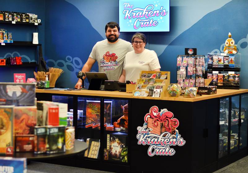 Cody Soehnlen and Jess Stewart, owners of The Kraken's Crate, want their new store in Newton to be a community hub for residents interested in playng board games, trading card games and role-playing games like Dungeons & Dragons.