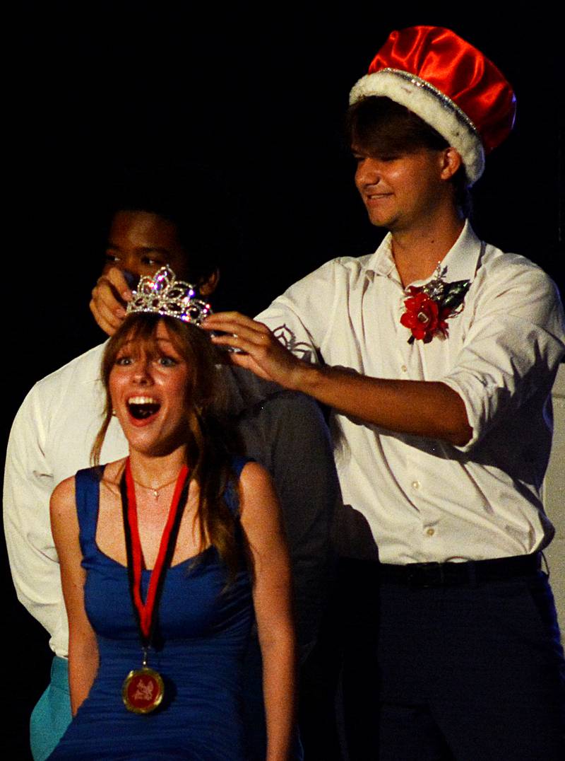 Kayden Langston reacts to being crowned the Newton High School Homecoming Queen during a coronation ceremony Sept. 18 in the high school gymnasium.