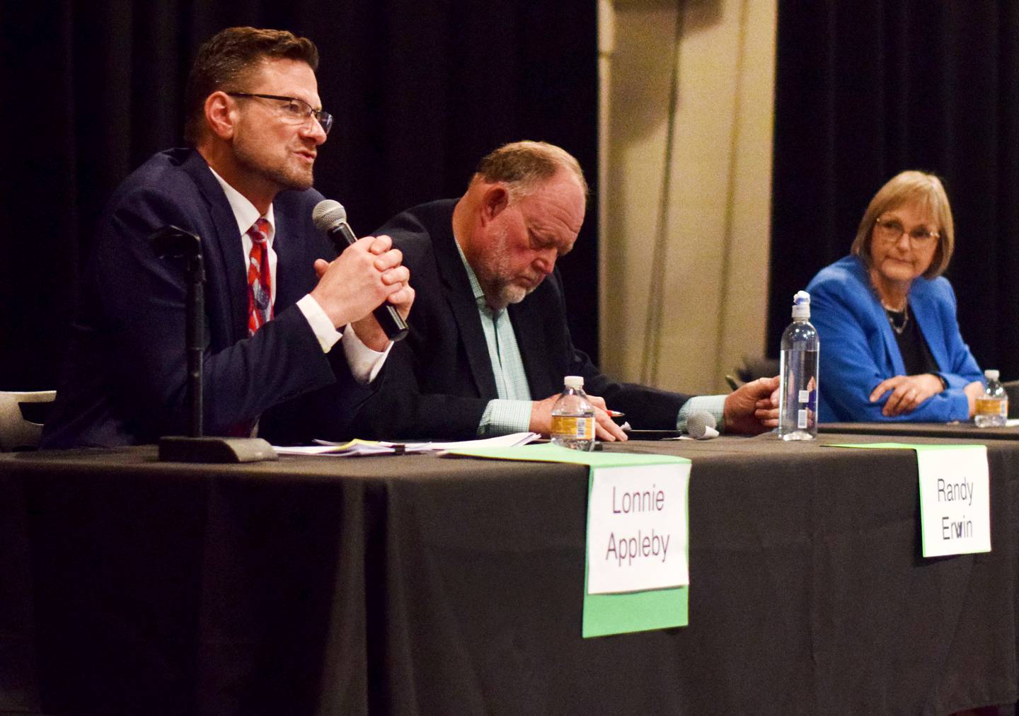 Newton mayoral candidates Lonnie Appleby, Randy Ervin and Evelyn George take turns speaking during the League of Women Voters of Jasper County forum on Oct. 26 at the auditorium of DMACC Newton Campus.