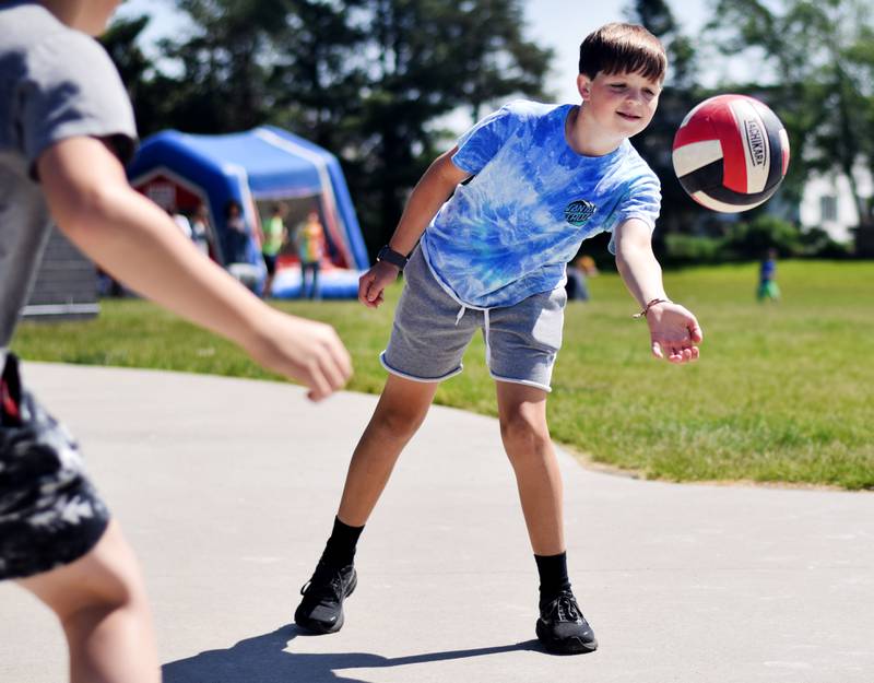 Eighth-grade students at Berg Middle School celebrate their last day as middle schoolers on May 26 by participating in carnival activities.