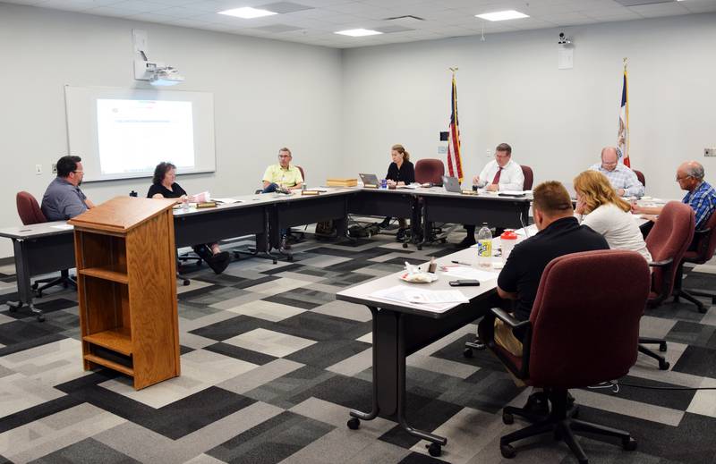 The Newton school board discusses the student disclosure of identity policy during its July 10 meeting.