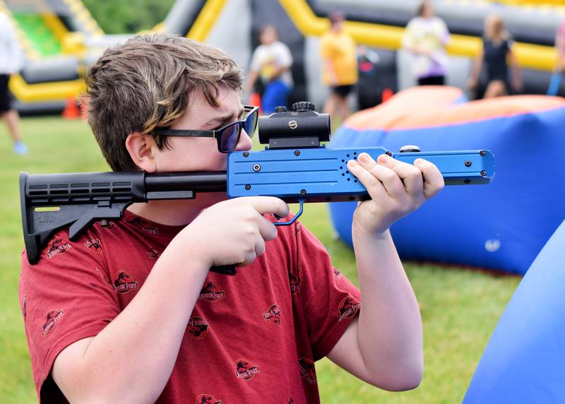 Kids enjoy all the games and activities available in the Fun Zone of Newton Fest on Saturday, June 10 at Maytag Park.