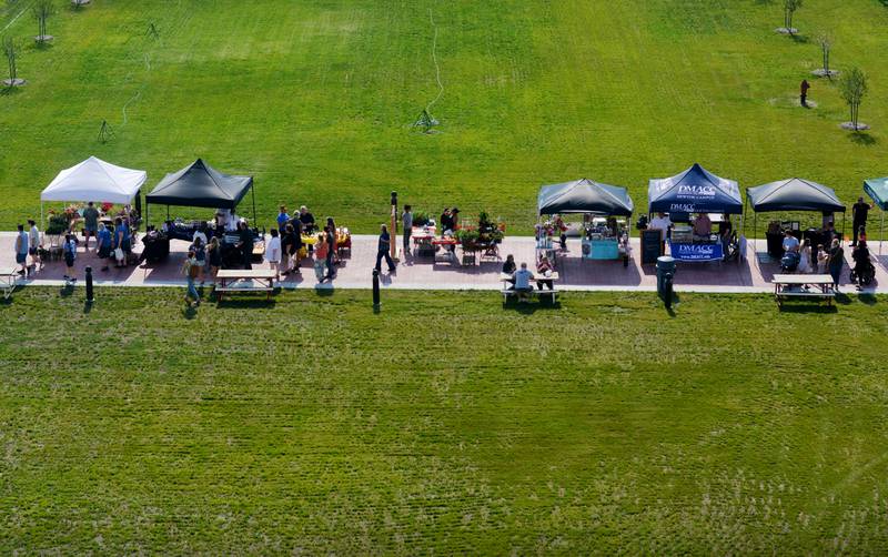 Newton Farmers Market moved from its downtown location to the greenspace of Legacy Plaza this year. The market, which is held 4-6 p.m. every Tuesday, saw hundreds of people attend. Organizers said 34 vendors participated in the market this year, the most the Newton Farmers Market has ever seen.