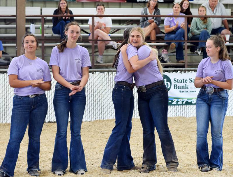 Lauren Zaabel and Rylin Titus hug after being named Reserve Champion Showman and Champion Showman, respectively, during the Brice Leonard Supreme Showmanship Contest on July 20 at the Jasper County Fair.