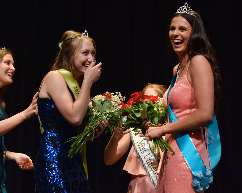 From left: Morgan Hansen is crowned the Jasper County Fair Princess and Lauren Zaabel is crowned the Jasper County Fair Queen during a June 18 pageant at the Newton Community Theatre.