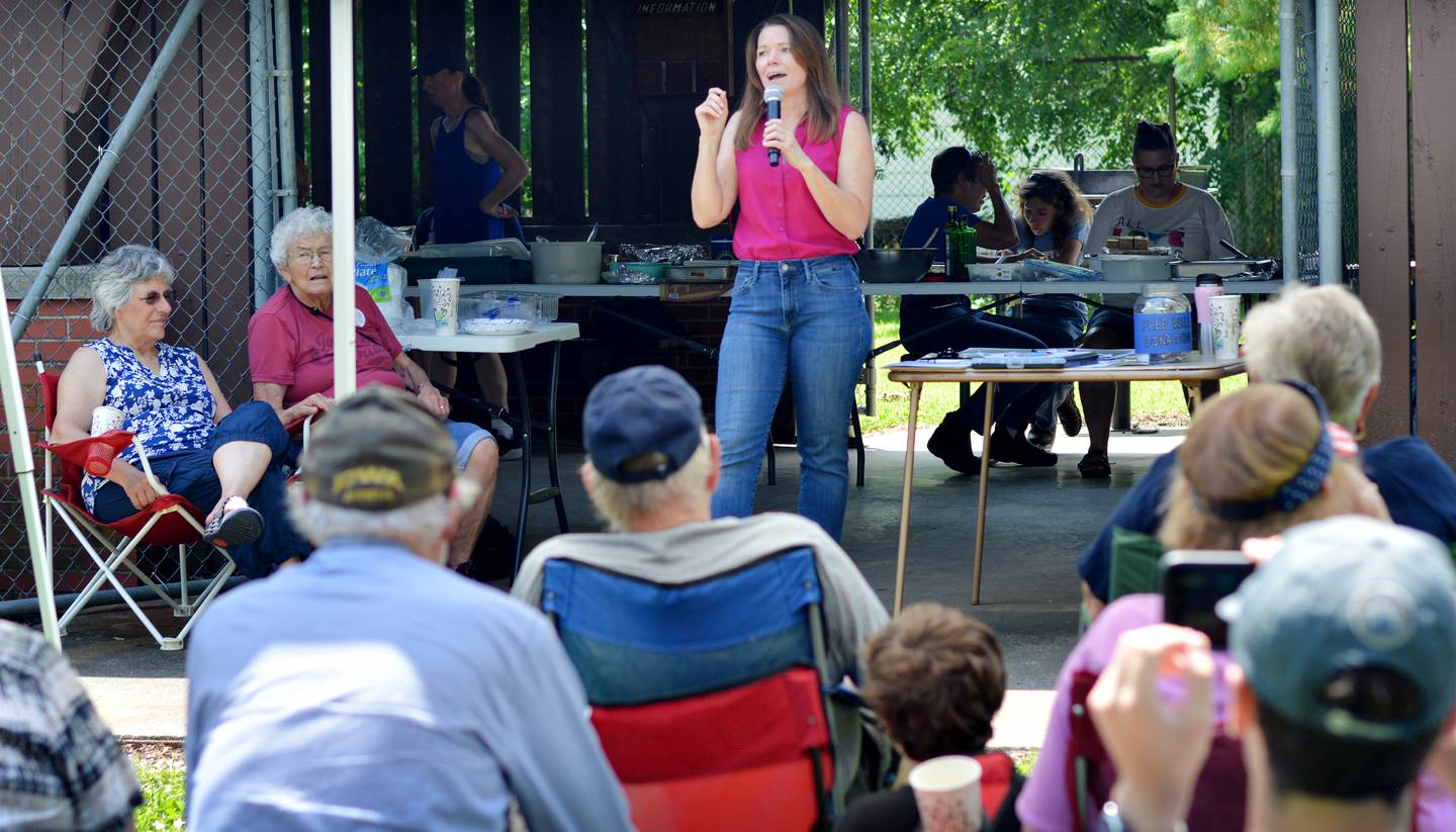 Christina Bohannan, a Democratic candidate seeking her third bid for Iowa's 1st Congressional District seat, speaks during a potluck picnic hosted by the Jasper County Democratic Party on June 28 in Maytag Park in Newton.