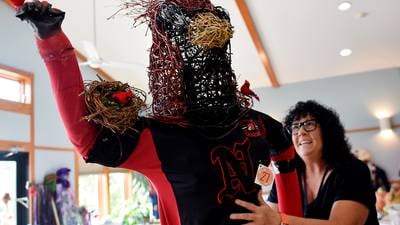 Photos: Volunteers prepare for Fall Fest and Scarecrow Walk at Newton Arboretum