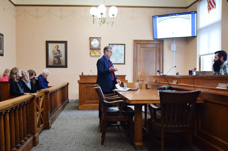 A representative of the Caldwell, Brierly & Chalupa, PLLC law firm, center, speaks to the Jasper County Board of Supervisors on May 3 inside the county courthouse in Newton.