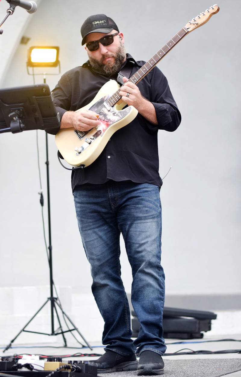 Damon Dotson, a Des Moines-based musician, performs the Maytag Bowl during the last night of Newton Fest on Saturday, June 10 at Maytag Park.