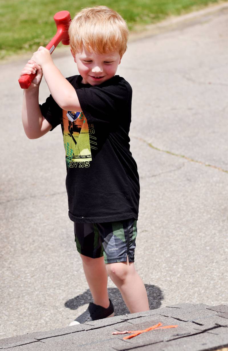 Kids participate in obstacle courses and take a try at the fire hose during Safety Fest on June 8 in Maytag Park. Safety Fest is regularly organized by the Newton Fire Department.