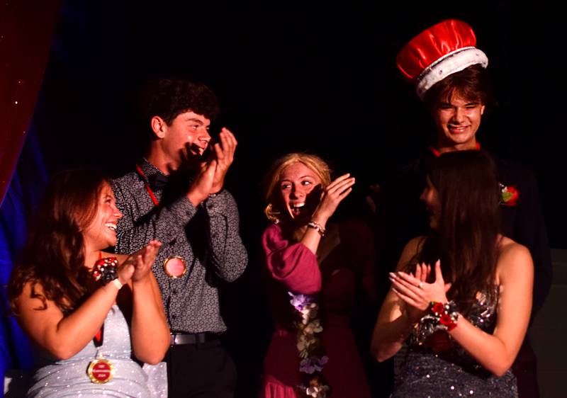 Zane Munger reacts to being crowned the 2024 Newton Homecoming King during a coronation ceremony on Sept. 19 in the high school gymnasium.