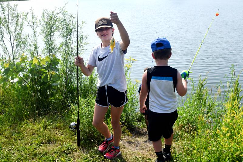 Young anglers catch bluegills and bass (and sometimes softshell turtles) during the Youth Fishing Derby on June 3 at Quarry Springs in Colfax.