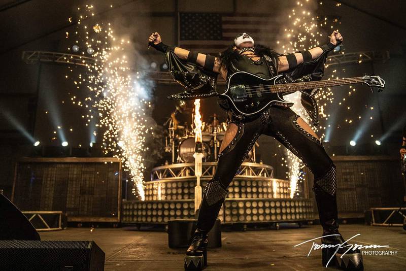 Dave Moody, of Hairball, performs as Gene Simmons from Kiss during a performance. Hairball will perform one of the three public nights at the Pyrotechnics Guild International Convention in Newton on Aug. 2 at the Iowa Speedway.