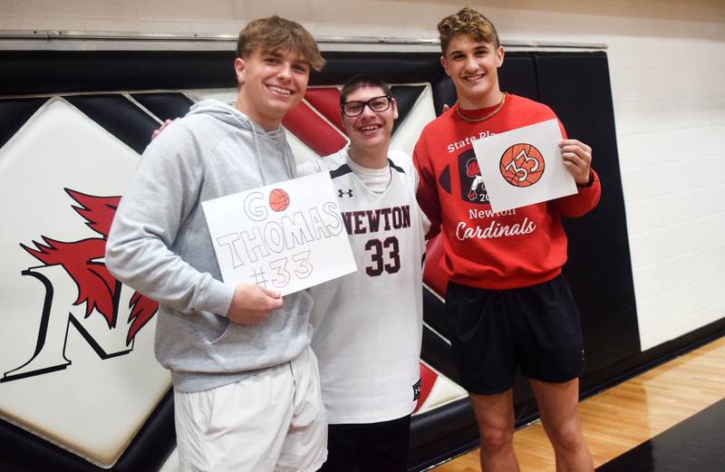 Thomas Russell poses with his fans after The Big Game on April 19 at Newton High School.