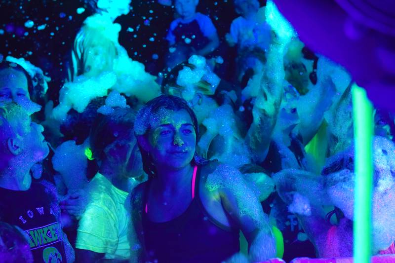 Kids enjoy the return of the Glow Foam Party – which featured two cannons this year – during Newton Fest on June 7 at Maytag Park.