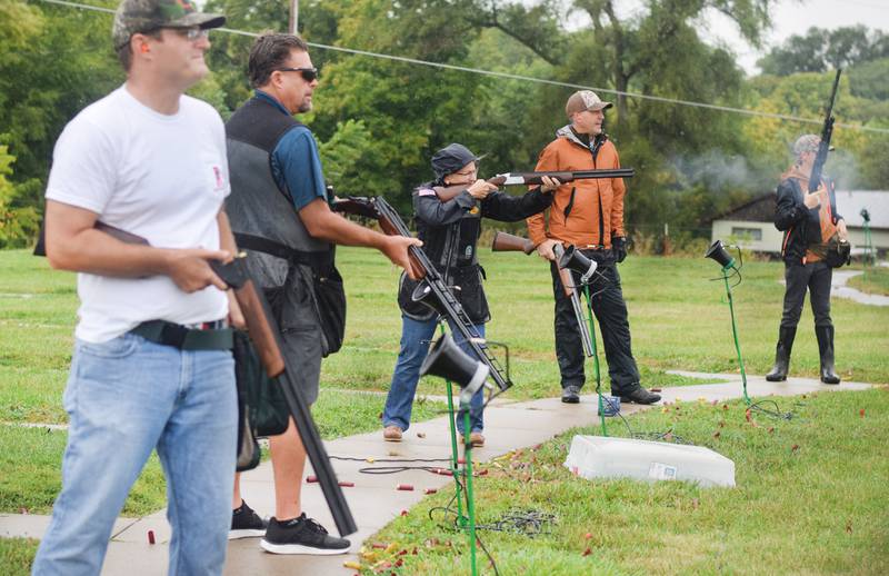 Congresswoman Mariannette Miller-Meeks, center, competes in a trap shoot alongside Iowa Sec. of Agriculture Mike Naig and Lt. Gov. Adam Gregg on Sept. 17 at the Jasper County Gun Club.