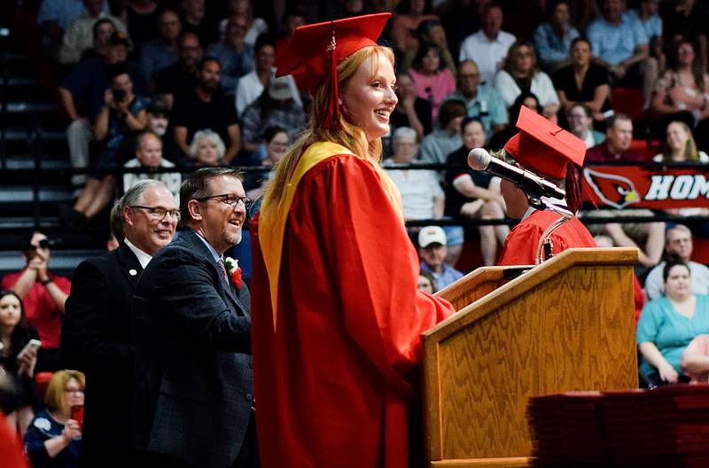 The Newton High School Class of 2024 seniors walk the stage during commencement on May 19 inside the high school gymnasium.