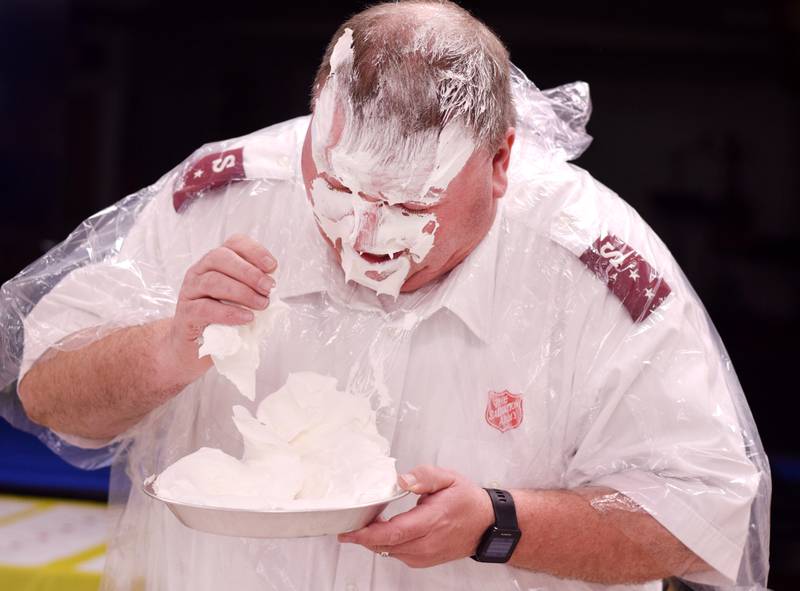 As a result of Rotary raising more funds for the Salvation Army than Kiwanis, Captain  Tim North voluntarily took a pie to the face during a volunteer recognition dinner April 19 at the organization's Newton headquarters.