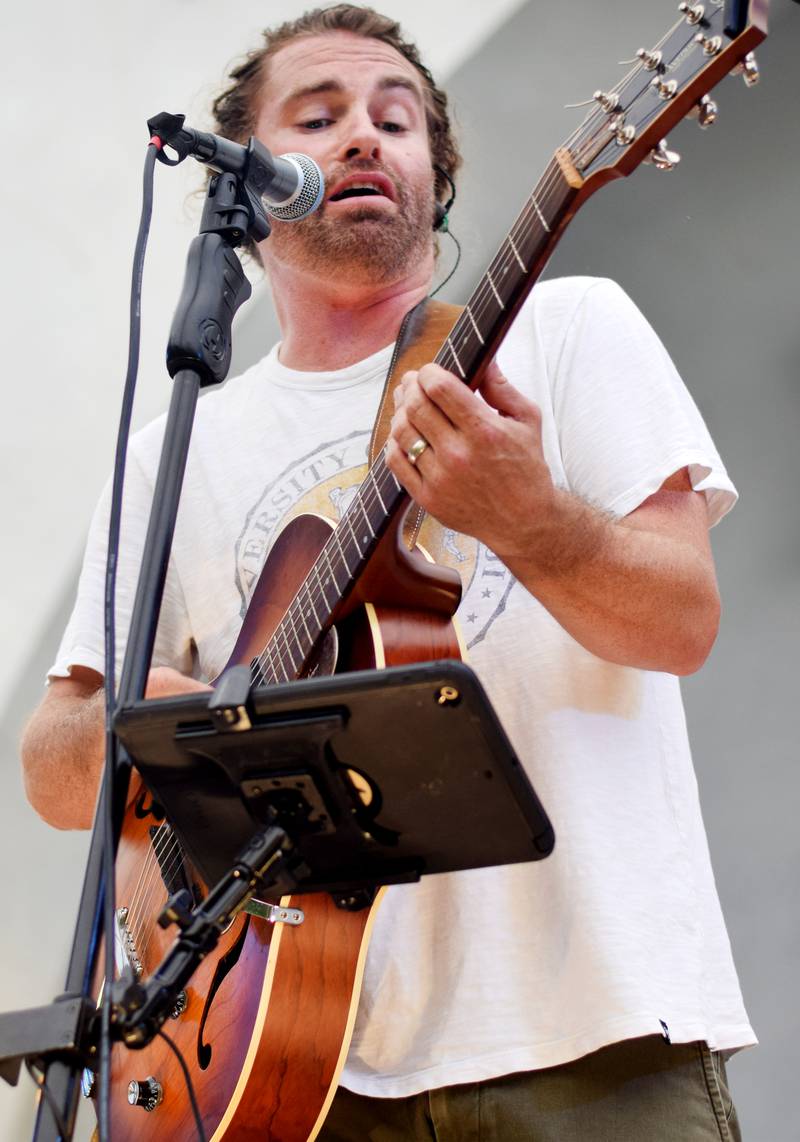 Damon Dotson, a Des Moines-based musician, performs the Maytag Bowl during the last night of Newton Fest on Saturday, June 10 at Maytag Park.